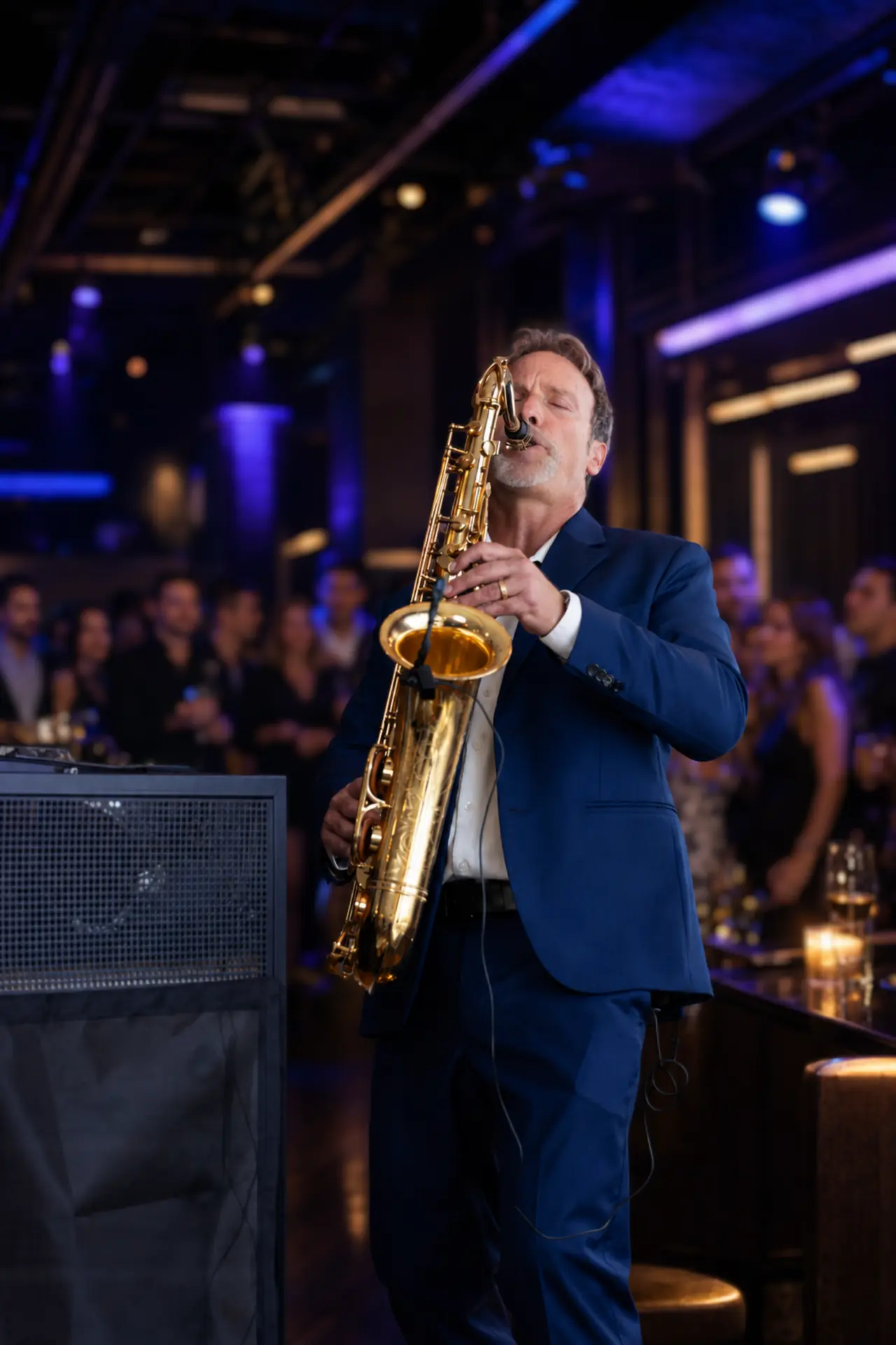 Howard performing live saxophone at an evening event